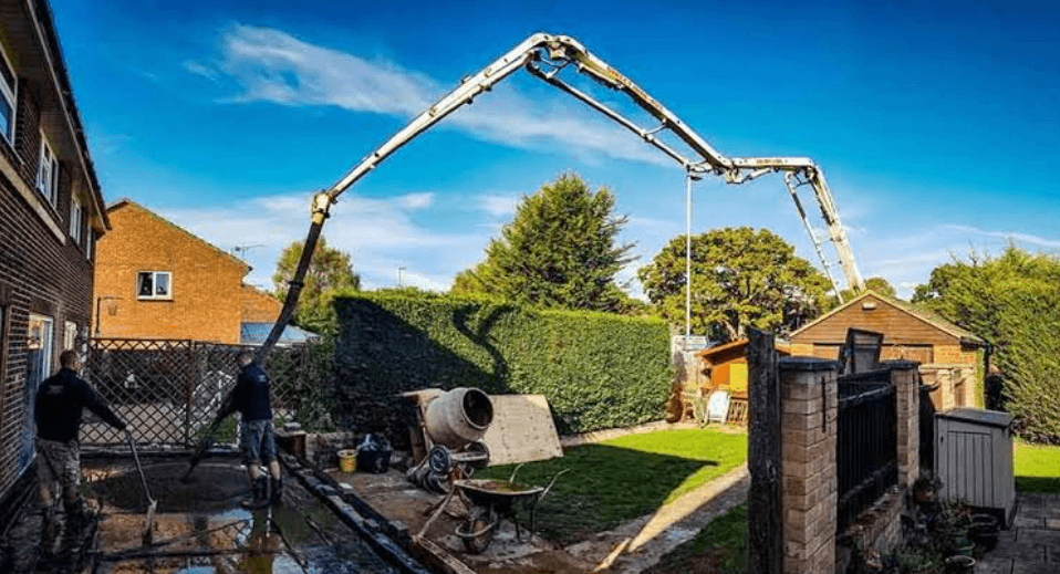 How High and Far Can A Concrete Boom Pump Actually Reach?